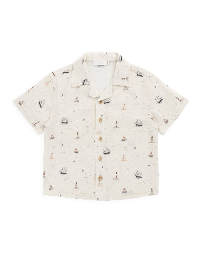Cream colored shirt with sailboat print