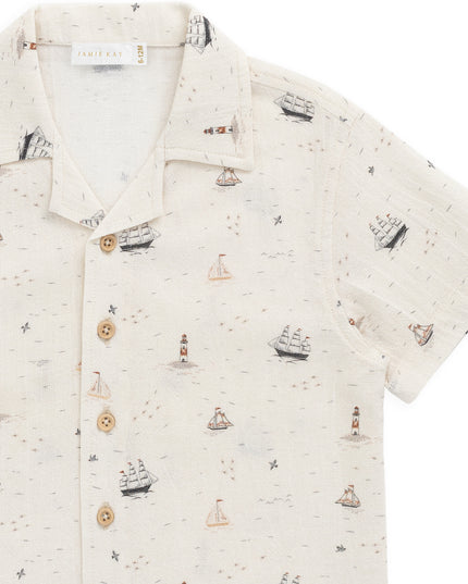 Cream colored shirt with sailboat print