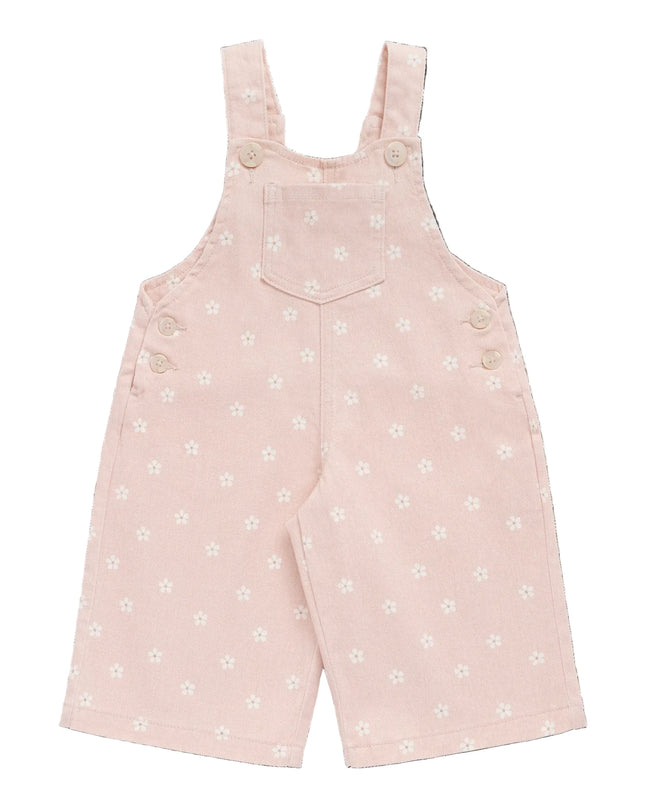 Pink overalls with white flowers