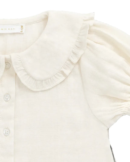 White button down blouse with ruffled collar and sleeves