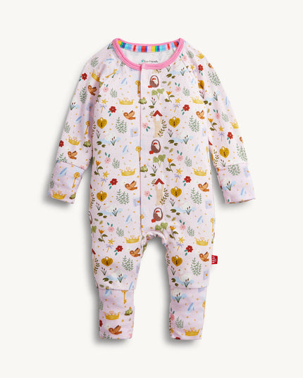 A baby convertible pink sleeper with a colorful woodland fairytale pattern of trees, flowers, and crowns, finished with pink trim on the collar.