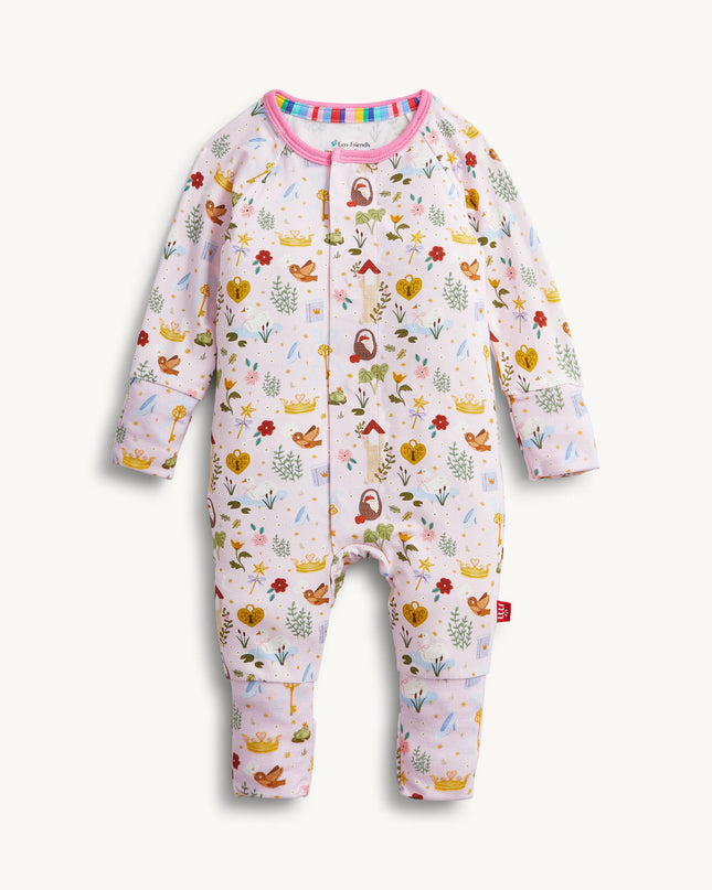 A baby convertible pink sleeper with a colorful woodland fairytale pattern of trees, flowers, and crowns, finished with pink trim on the collar.