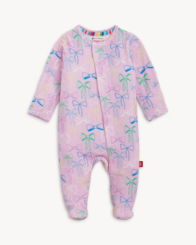 Purple footie pajamas with bow pattern