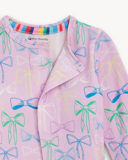 Purple pajamas with bow pattern and magnetic closure