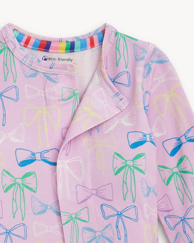 Purple pajamas with bow pattern and magnetic closure