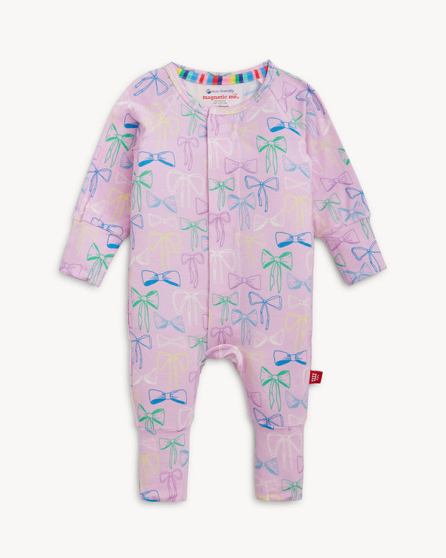 Purple convertible pajamas with bow pattern and magnetic closure