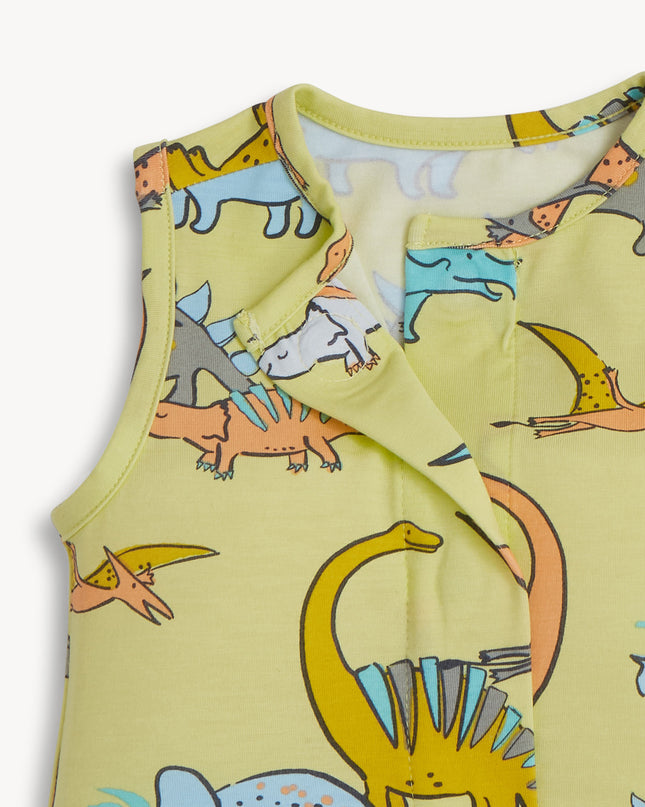 Green baby romper with dinosaur print