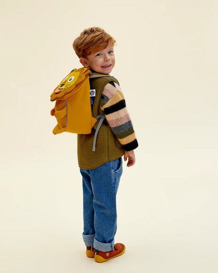 Boy wearing a Lion shaped children's backpack