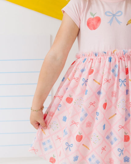 Girl wearing Pink tutu dress with back to school design