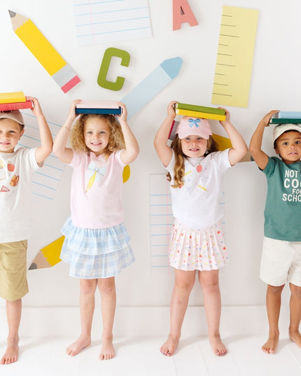 Kids wearing fun back to school outfits