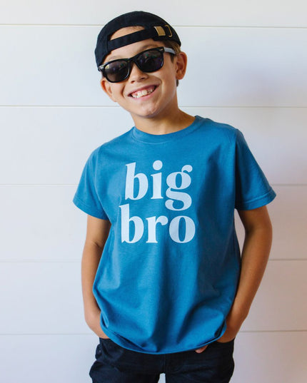 Boy wearing blue big bro t-shirt