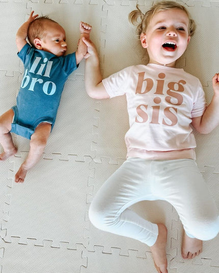 girl wearing big sis t-shirt and baby wearing lil bro bodysuit