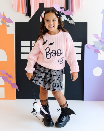 Girl wearing Dark grey tulle tutu with black velvet bats, stars and moons and Boo Sweater
