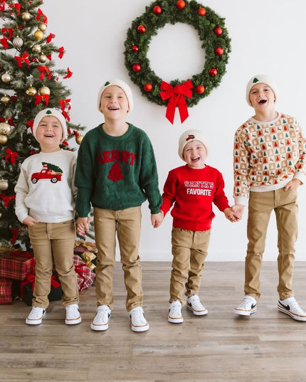 Boys wearing festive Christmas outfits