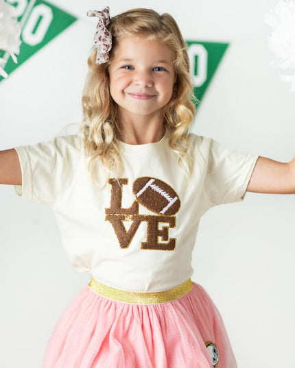 Girl wearing "Love" Football Patch Short Sleeve T-Shirt
