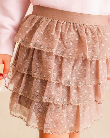 Girl wearing brown polka dot ruffle tutu skirt