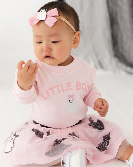 Baby wearing Pink baby romper with 'LITTLE BOO' text and ghost patch