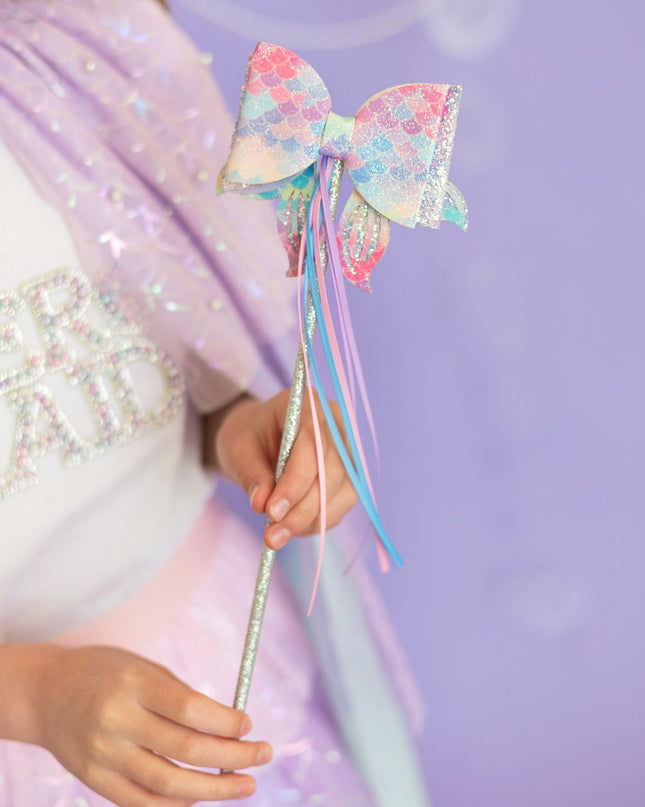 Girl holding mermaid wand