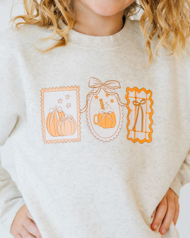 Girl Wearing Natural Heather Sweatshirt with Pumpkin Design