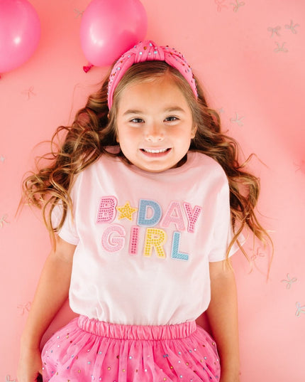 Girl Wearing Pink T-Shirt with Rhinestone B-Day Girl Patch