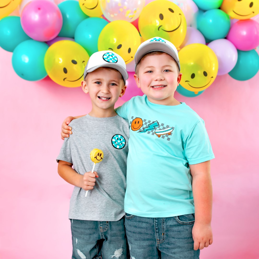 Sweet Wink Smiley Checker Patch Trucker Hat