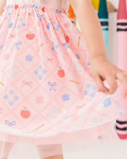 Girl wearing Pink tutu dress with back to school design
