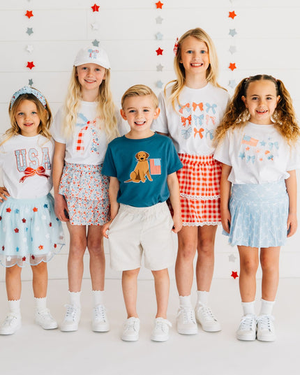 Kids wearing fun red, white and blue outfits