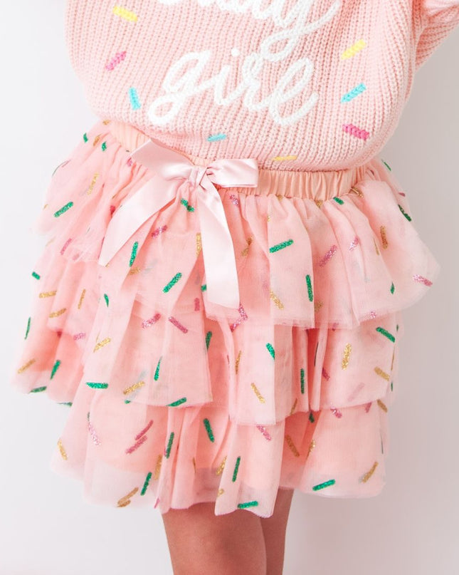 Girl wearing Pink tutu skirt with sprinkles