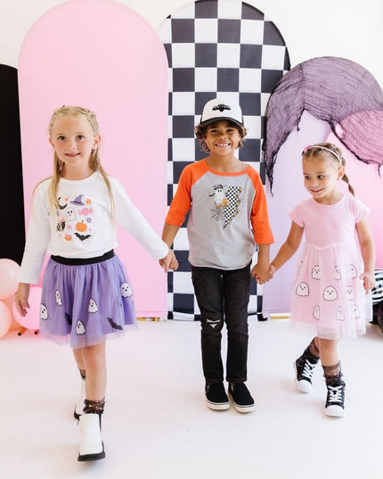 Kids wearing fun halloween outfits