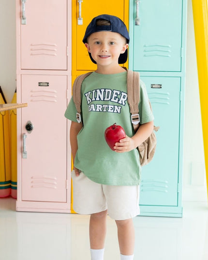 Boy wearing Kindergarten Varsity Short Sleeve Green T-Shirt