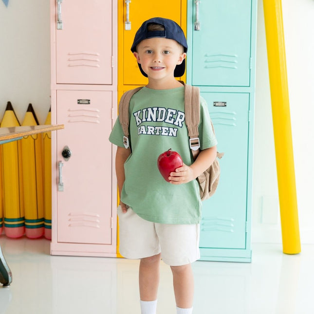 Boy wearing Kindergarten Varsity Short Sleeve Green T-Shirt