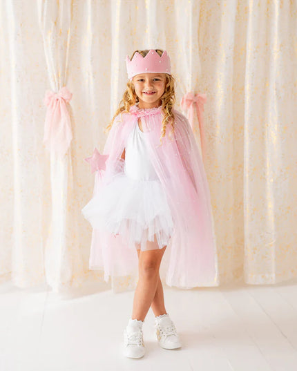 Girl wearing pink and pearl dress up kit