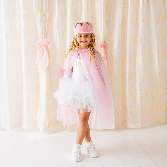 Girl wearing pink and pearl dress up kit