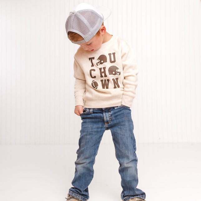 Boy wearing touchdown football sweatshirt