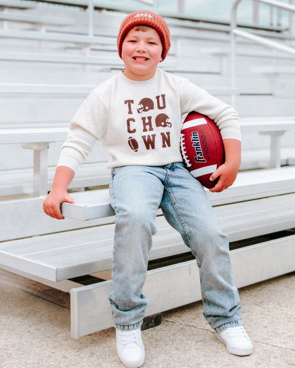 Boy holding football and wearing Touchdown Football Sweatshirt