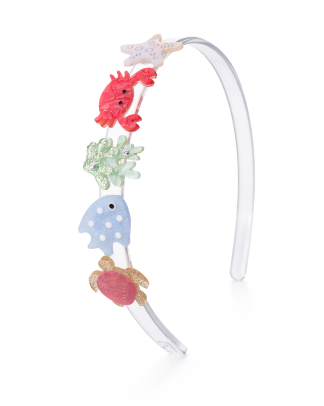 Headband featuring ocean-inspired details including a turtle, blue fish, green coral, crab and seashell