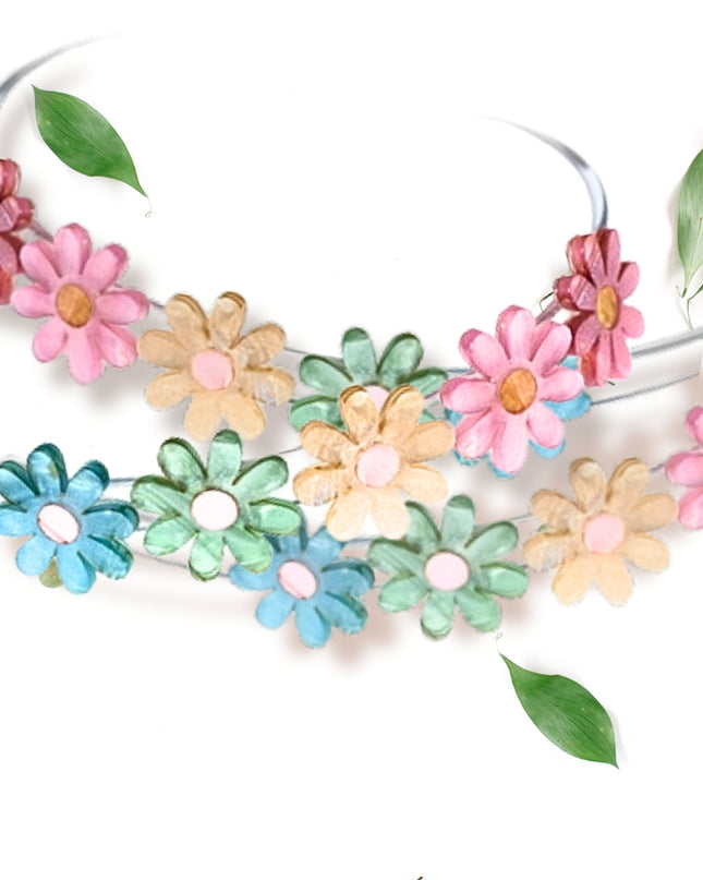 Three colorful flower headbands displayed together