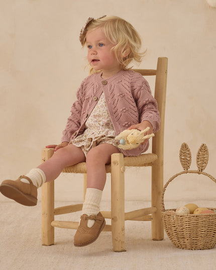 Girl wearing Floral baby outfit with top and bloomers