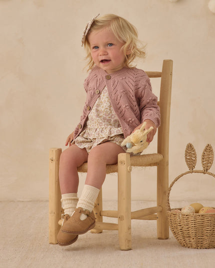 Girl wearing Floral baby outfit with top and bloomers