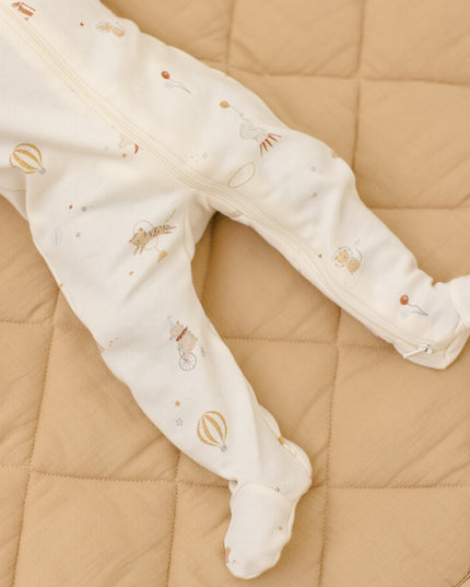 Longsleeve footie pajamas with a carnival print