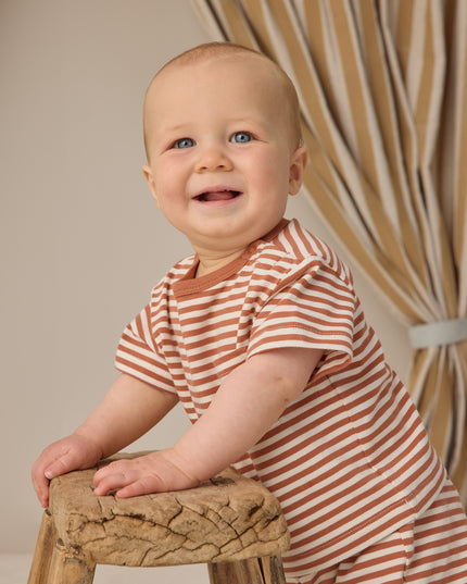 Baby wearing striped shirt and shorts set 