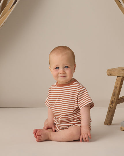 Baby wearing striped shirt and shorts set 