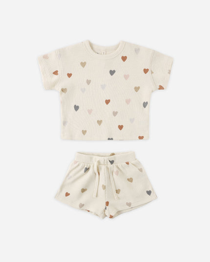 Cream colored top and short set with confetti heart print