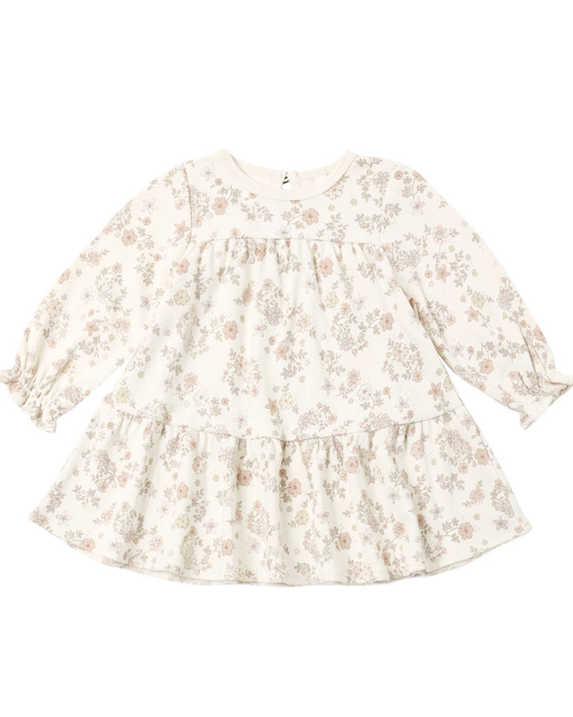 A long-sleeve baby dress with a tiered ruffle hem, featuring a delicate beige and floral pattern