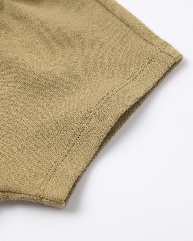 Close up of the honey colored shorts