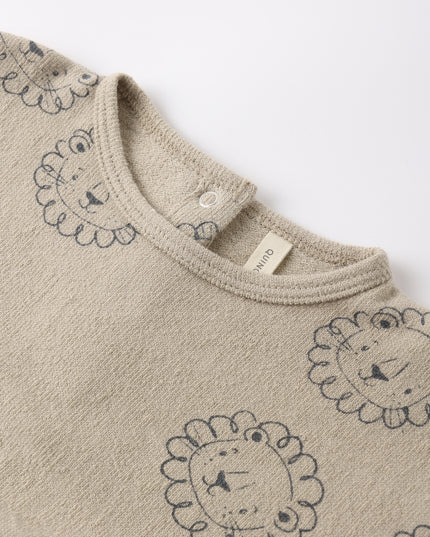 Beige baby romper with lion print