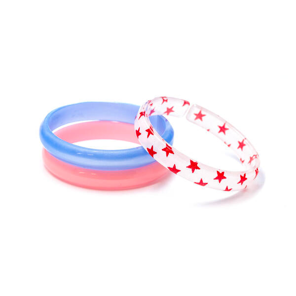 Bangle set featuring one red bracelet, one blue bracelet and one white bracelet with red stars