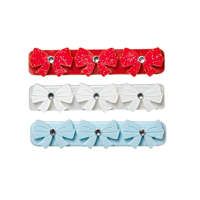 3 hair clips with red, white and blue bows
