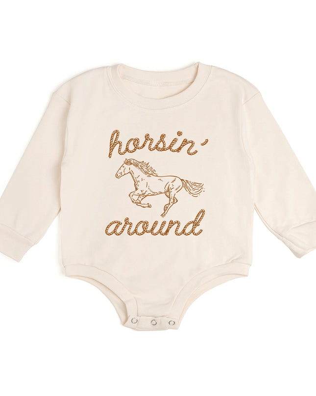 Baby romper with 'horsin' around' graphic