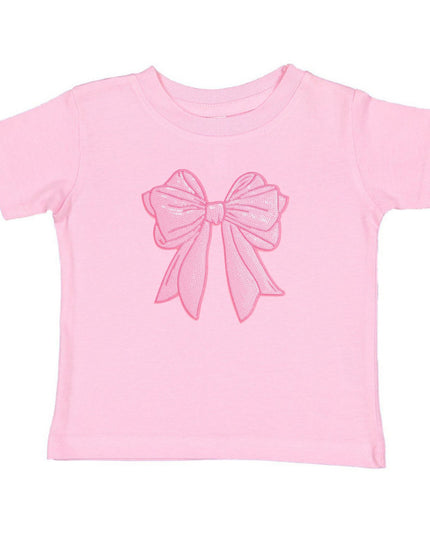 Pink t-shirt with oversized sequin bow patch